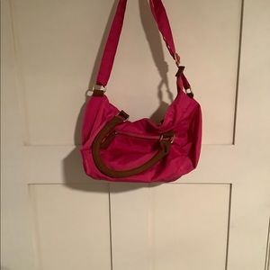 Pink hand bag with over should strap